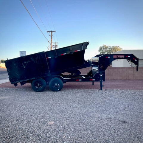Roll-off dumpster tilted in dump position